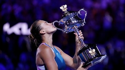 Belarus’ Aryna Sabalenka celebrates with the trophy after winning her final match against Kazakhstan’s Elena Rybakina (REUTERS)