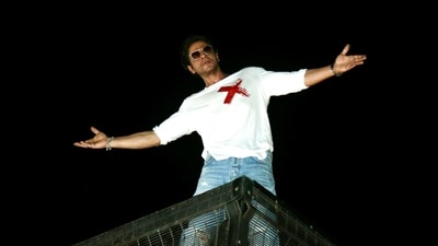 Mumbai, Nov 02 (ANI): Bollywood actor Shah Rukh Khan greets his fans who were gathered outside his home at Mannat on his 58th birthday, in Mumbai on Thursday. (ANI Photo) (Sunil Khandare) Mumbai, Nov 02 (ANI): Bollywood actor Shah Rukh Khan greets his fans who were gathered outside his home at Mannat on his 58th birthday, in Mumbai on Thursday. (ANI Photo) (Sunil Khandare)
