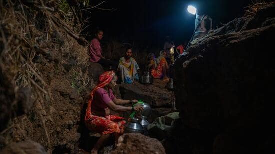 In the month of December there is a water crisis in the Fughale village in Shahpur Tehsil. Village women are spending whole nights in the forest to collect the water from natural sources.Thane, India Dec 29,2023. (Photo by Raju Shinde/HT Photo)