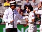 Mohammad Rizwan (C) and Agha Salman (R) argue with umpire Joel Wilson (L) after Rizwan's dismissal on the fourth day of the second Test Mohammad Rizwan (C) and Agha Salman (R) argue with umpire Joel Wilson (L) after Rizwan's dismissal on the fourth day of the second Test