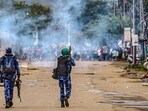 Imphal: Security personnel fire tear gas shells as students protest against the "killing" of two missing students by unknown miscreants and demand peace in Manipur. Imphal: Security personnel fire tear gas shells as students protest against the "killing" of two missing students by unknown miscreants and demand peace in Manipur.