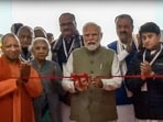 Prime Minister Narendra Modi with Uttar Pradesh governor Anandiben Patel, chief minister Yogi Adityanath, deputy chief minister Keshav Prasad Maurya, Union civil aviation minister Jyotiraditya Scindia and others inaugurates Maharshi Valmiki International Airport, in Ayodhya (PTI) Prime Minister Narendra Modi with Uttar Pradesh governor Anandiben Patel, chief minister Yogi Adityanath, deputy chief minister Keshav Prasad Maurya, Union civil aviation minister Jyotiraditya Scindia and others inaugurates Maharshi Valmiki International Airport, in Ayodhya (PTI)