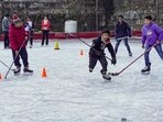 People at an ice-skating rink at Lakkar Bazar, in Shimla on Friday, December 29, 2023.