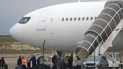 Crew members board the plane grounded by police at the Vatry airport (AFP Photo) Crew members board the plane grounded by police at the Vatry airport (AFP Photo)