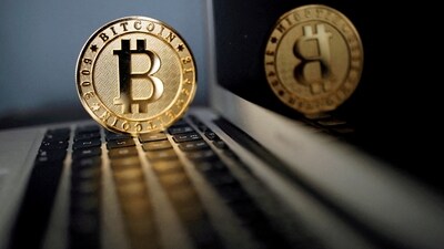 FILE PHOTO: Bitcoin's $32,000 drop looms if ETF approval hits. REUTERS/Benoit Tessier/File Photo (REUTERS)