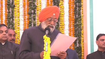 Surendra Pal Singh takes oath as minister of Rajasthan. (DIPR Rajasthan ) Surendra Pal Singh takes oath as minister of Rajasthan. (DIPR Rajasthan )
