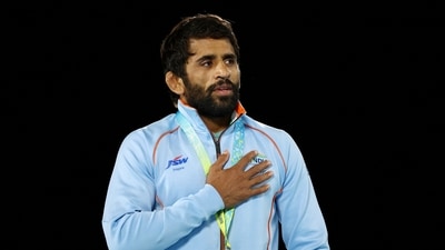 Gold Medallist India's Bajrang Punia celebrates on the podium during the medal ceremony (REUTERS)