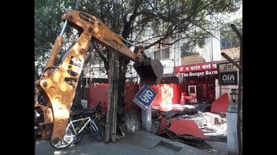 On Saturday, the Dhole Patil Road ward office, Building Permission and Development, Sky and Sign Department jointly conducted an anti-encroachment drive on illegal hotels and shops at Koregaon Park and Ghorpade area. (HT PHOTO) On Saturday, the Dhole Patil Road ward office, Building Permission and Development, Sky and Sign Department jointly conducted an anti-encroachment drive on illegal hotels and shops at Koregaon Park and Ghorpade area. (HT PHOTO)