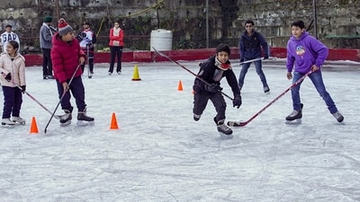 People at an ice-skating rink at Lakkar Bazar, in Shimla on Friday, December 29, 2023. (PTI) People at an ice-skating rink at Lakkar Bazar, in Shimla on Friday, December 29, 2023. (PTI)