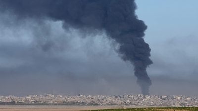 A picture taken from a position in southern Israel, along the border with the Gaza Strip, shows smoke billowing over the Palestinian territory during Israeli bombardment on December 29, 2023, amid continuing battles between Israel and the militant group Hamas. (AFP) A picture taken from a position in southern Israel, along the border with the Gaza Strip, shows smoke billowing over the Palestinian territory during Israeli bombardment on December 29, 2023, amid continuing battles between Israel and the militant group Hamas. (AFP)