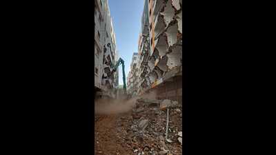 The action was carried out near Sinhagad College in Survey No. 1, where civic authorities had served notices in 2021 during the construction phase, although the builders did not act at that time. (HT PHOTO) The action was carried out near Sinhagad College in Survey No. 1, where civic authorities had served notices in 2021 during the construction phase, although the builders did not act at that time. (HT PHOTO)