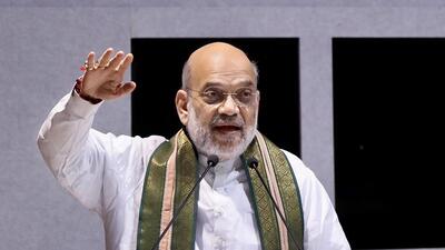 Union home minister Amit Shah addresses during the National Cooperative Dairy Federation of India Limited e-market awards, in Gandhinagar (PTI) Union home minister Amit Shah addresses during the National Cooperative Dairy Federation of India Limited e-market awards, in Gandhinagar (PTI)