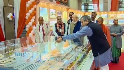 PM Modi is being briefed by railway minister Ashwini Vaishnaw about the redeveloped railway station in Ayodhya post its inauguration. Uttar Pradesh chief minister Yogi Adityanath, governor Anandiben Patel, deputy chief minister Keshav Prasad Maurya are seen along with the prime minister. (PTI)