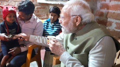 PM Modi interacting with the family members of Meera Manjhi, a Ujjwala scheme beneficiary, in Ayodhya on Saturday PM Modi interacting with the family members of Meera Manjhi, a Ujjwala scheme beneficiary, in Ayodhya on Saturday