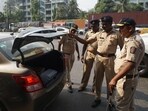 Mumbai Police  is conducting security and checking of motorists at Mumbai entry point Mulund toll naka check,in Mumbai. (Praful Gangurde / HT Photo )