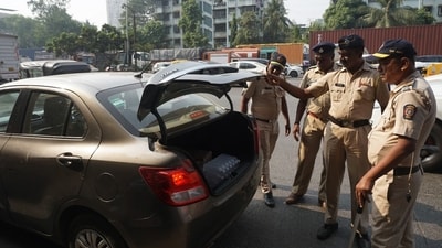 Mumbai Police  is conducting security and checking of motorists at Mumbai entry point Mulund toll naka check,in Mumbai. (Praful Gangurde / HT Photo )