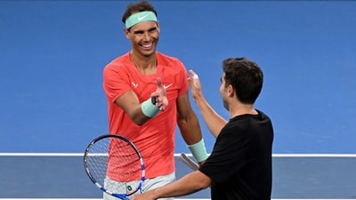 Spain's Rafael Nadal (L) shakes hands with partner Marc Lopez after losing their men's doubles match against Australia's Max Purcell and Jordan Thompson at the Brisbane International tennis tournament in Brisbane on December 31 (AFP) Spain's Rafael Nadal (L) shakes hands with partner Marc Lopez after losing their men's doubles match against Australia's Max Purcell and Jordan Thompson at the Brisbane International tennis tournament in Brisbane on December 31 (AFP)