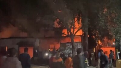 Earlier, residents had claimed at least five workers were trapped inside the building. (ANI) Earlier, residents had claimed at least five workers were trapped inside the building. (ANI)