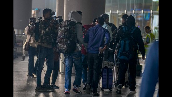 A charter plane was grounded in France for a human trafficking investigation arrived in India with 276 Indians aboard, authorities said. (AP)