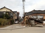 This general view shows badly damaged buildings along a street in the city of Wajima, Ishikawa prefecture on January 1, 2024, after a major 7.5 magnitude earthquake struck the Noto region in Ishikawa prefecture. This general view shows badly damaged buildings along a street in the city of Wajima, Ishikawa prefecture on January 1, 2024, after a major 7.5 magnitude earthquake struck the Noto region in Ishikawa prefecture.