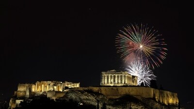 New Year 2024: Fireworks explode over the ancient Parthenon temple at the Acropolis hill during New Year's celebrations in Athens, Greece. (AP) New Year 2024: Fireworks explode over the ancient Parthenon temple at the Acropolis hill during New Year's celebrations in Athens, Greece. (AP)