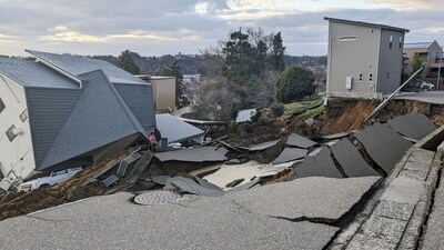 A view of a collapsed road and houses because of an earthquake in Wajima, Ishikawa prefecture, Japan January 1, 2024, in this photo released by Kyodo. (via REUTERS)