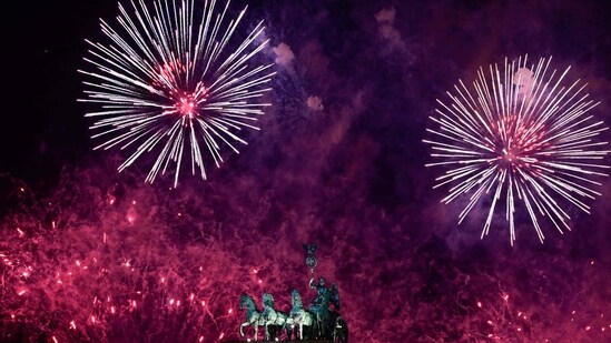 New Year 2024: A view of the quadriga of Berlin's landmark Brandenburg Gate to usher in the New Year on January 1.&nbsp;(AFP)