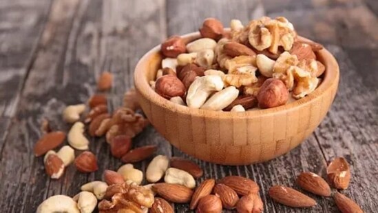 Nuts: Snack smart with a handful of nuts - a heart-healthy choice that can improve your cholesterol profile.&nbsp;(Unsplash)