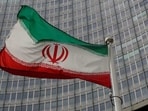 An Iranian flag flutters.