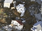 Houses fallen by an earthquake are seen in Kanazawa, Ishikawa prefecture, Japan Tuesday, Jan. 2, 2024.
