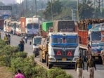 Trucks are parked on a highway amid 'rasta roko' protest by truck drivers. (PTI) Trucks are parked on a highway amid 'rasta roko' protest by truck drivers. (PTI)