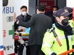 South Korea's opposition Democratic Party leader Lee Jae-myung arrives on a stretcher at Seoul National University Hospital after being stabbed. (Reuters)