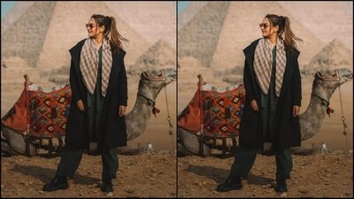 Sonakshi's winter look is all about sass and glamour as the actress stuns in a green loose fitted jumpsuit featuring a self-tied belt at the waist. She teamed it with a beige-brown checkered scarf and an oversized black blazer perfectly complementing her look. (Instagram/@aslisona) Sonakshi's winter look is all about sass and glamour as the actress stuns in a green loose fitted jumpsuit featuring a self-tied belt at the waist. She teamed it with a beige-brown checkered scarf and an oversized black blazer perfectly complementing her look. (Instagram/@aslisona)