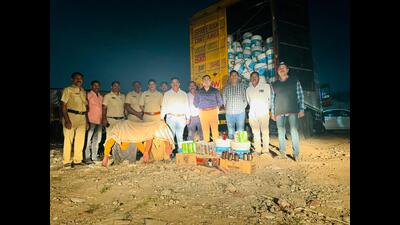 Officials said that, during an inspection of the suspicious truck, officials found more than 1,000 liquor bottle boxes. (HT PHOTO)