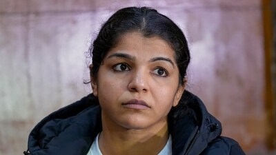 New Delhi: Wrestler Sakshi Malik during a press conference after Sanjay Singh, an associate of BJP MP and former chief of Wrestling Federation of India (WFI) Brij Bhushan Sharan Singh, became the new President of WFI, in New Delhi, Thursday, Dec. 21, 2023. (PTI Photo/Vijay Verma)(PTI12_21_2023_000337A) (PTI) New Delhi: Wrestler Sakshi Malik during a press conference after Sanjay Singh, an associate of BJP MP and former chief of Wrestling Federation of India (WFI) Brij Bhushan Sharan Singh, became the new President of WFI, in New Delhi, Thursday, Dec. 21, 2023. (PTI Photo/Vijay Verma)(PTI12_21_2023_000337A) (PTI)