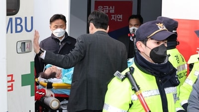 South Korea's opposition Democratic Party leader Lee Jae-myung arrives on a stretcher at Seoul National University Hospital after being stabbed. (Reuters)