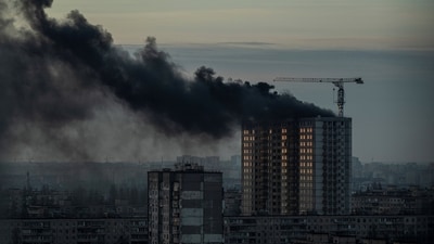 Smoke rises over a residential building after a Russian missile and drone strike, amid Russia's attack on Ukraine, in Kyiv, Ukraine December 29, 2023. (Reuters)