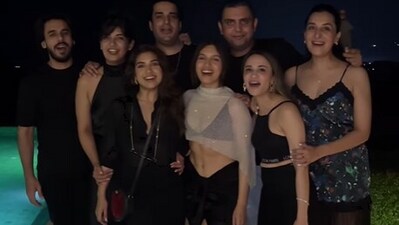 Bhumi Pednekar had a gala time with her family and friends on New Year Eve. She and her sister Samiksha posed for the camera in a group photo from their beach destination. The actor wore black bralette and matching sarong, teamed with a shrug. Bhumi has also been sharing her New Year holiday pictures and videos on Instagram. Bhumi Pednekar had a gala time with her family and friends on New Year Eve. She and her sister Samiksha posed for the camera in a group photo from their beach destination. The actor wore black bralette and matching sarong, teamed with a shrug. Bhumi has also been sharing her New Year holiday pictures and videos on Instagram. 