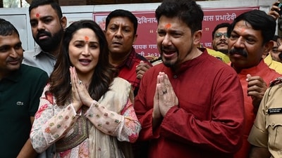 Madhuri Dixit and her husband Shriram Nene during their visit at Siddhivinayak temple in Mumbai. (AFP) Madhuri Dixit and her husband Shriram Nene during their visit at Siddhivinayak temple in Mumbai. (AFP)