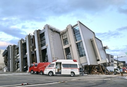 A collapsed building caused by an earthquake is seen in Wajima, Ishikawa prefecture, Japan on January 2, 2024. (Reuters)