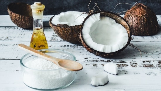 Coconut oil: Coconut oil is anti-inflammatory and antioxidant that helps in cooling down the burn and preventing blistering and scarring of the burned skin. Apply virgin coconut oil directly to the affected area.(Unsplash)