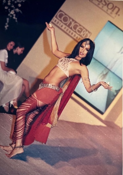Malika in an opening act with diyas in hand in one of Rina Dhaka's show. Malika in an opening act with diyas in hand in one of Rina Dhaka's show.
