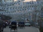 Bangladesh Elections 2024: Election campaign posters of Awami League hang on a road as traffic moves past ahead of the general election, in Dhaka.