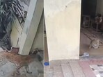 The image shows a leopard entering a house in Gurugram. The image shows a leopard entering a house in Gurugram.