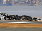 Japan Plane Accident: The burn-out Japan Airlines plane is seen at Haneda airport in Tokyo, Japan.