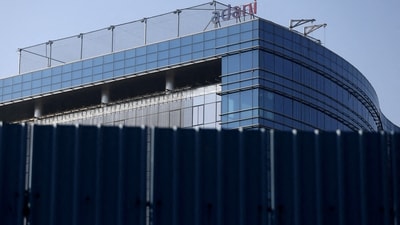 A logo of the Adani Group is seen on a commercial complex in Mumbai. (Reuters)
