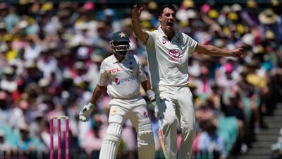 Australia's Pat Cummins appeals successfully for an LBW against Babar Azam (AP) Australia's Pat Cummins appeals successfully for an LBW against Babar Azam (AP)