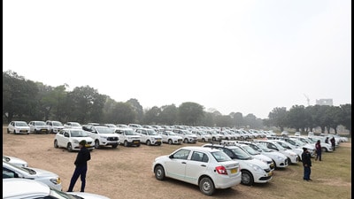 Cabs stationed at the ground near YPS Chowk in Mohali amid the strike on Wednesday. (RAVI KUMAR/HT) Cabs stationed at the ground near YPS Chowk in Mohali amid the strike on Wednesday. (RAVI KUMAR/HT)