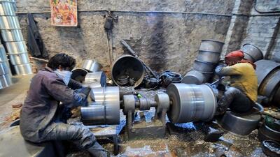 Labourers works in a utensil manufacturing factory at Micro, Small, and Medium Enterprises (MSME). (ANI File Photo)