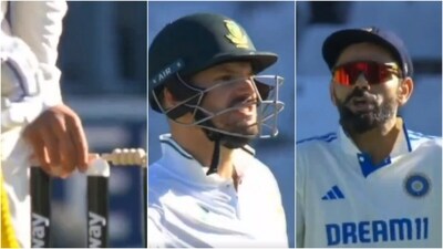 Virat Kohli swaps bails right before the final ball of Day 1, leading to an on-field argument (X) Virat Kohli swaps bails right before the final ball of Day 1, leading to an on-field argument (X)